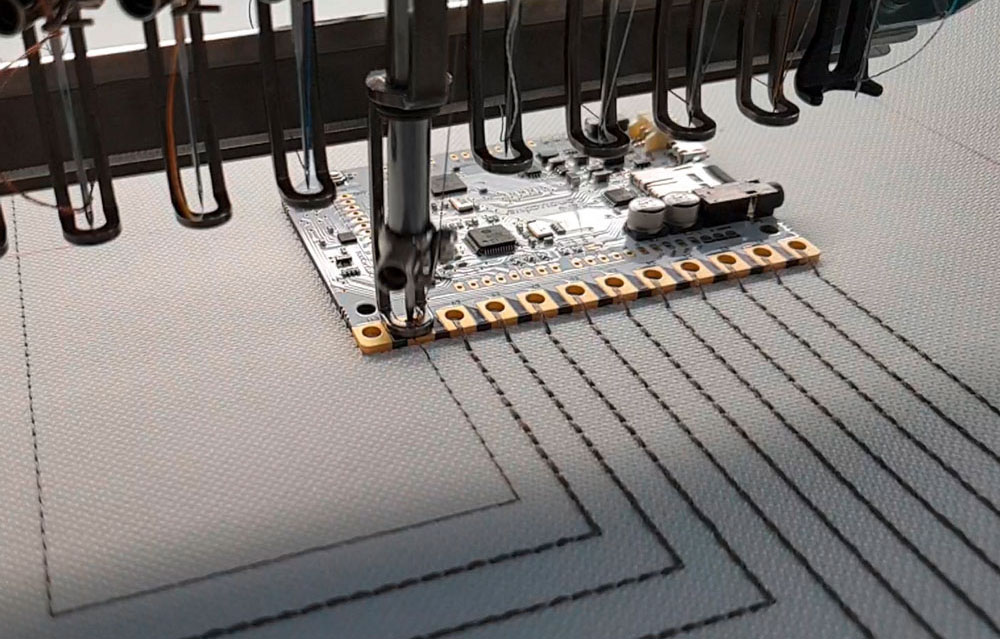 In Textil integrierte Technik